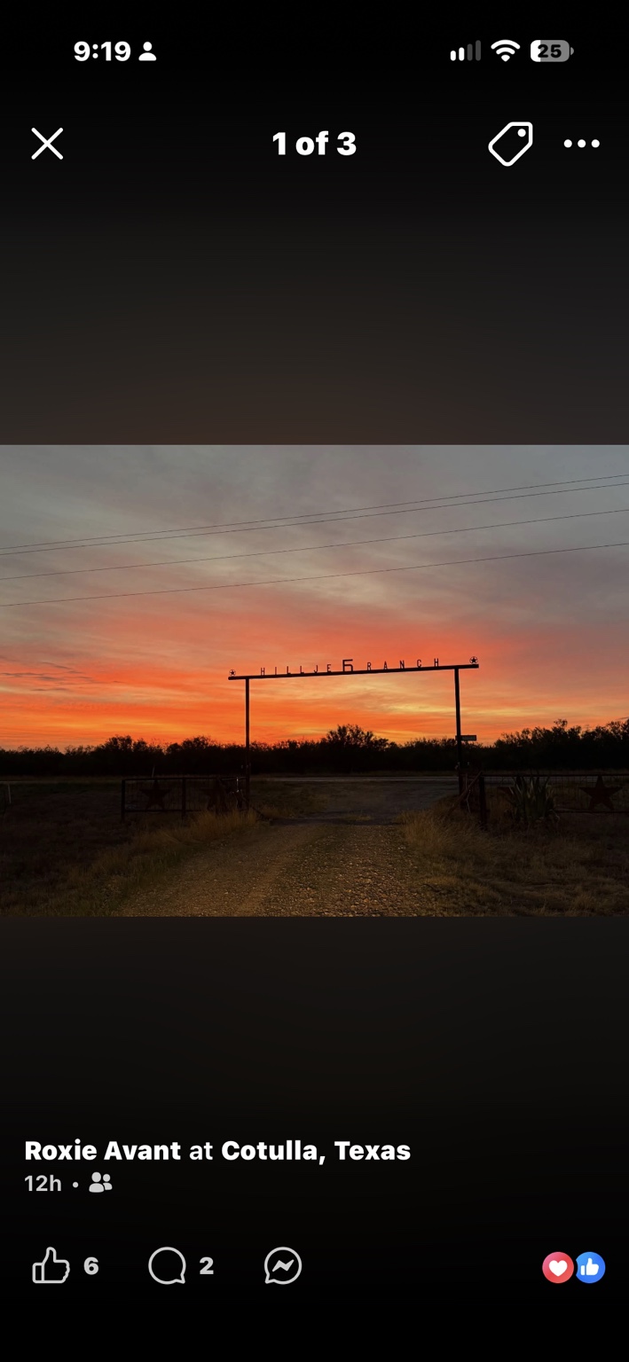 Hillje Ranch entrance beneath a vivid orange sunset, photographed by Roxie Avant